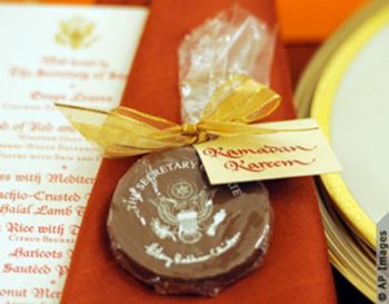 A menu and place setting, including an edible State Department seal, for the 2010 State Department iftar to celebrate the end of Ramadan (Photo Credits: AP Images)