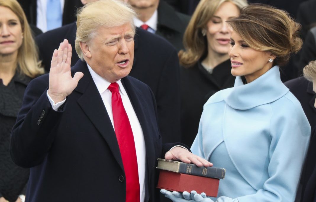 Donald Trump is sworn in as the 45th president as Melania Trump holds a bible Trump's mother gave him when he was a boy atop the bible used by President Lincoln at his first inauguration. (Photo: AP Images)