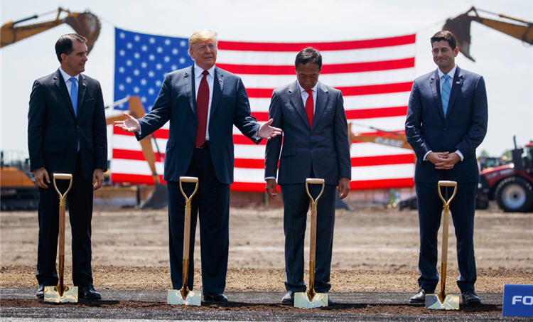 Eleven months after Foxconn announced plans for a $10 billion electronics plant in Wisconsin, President Trump led dignitaries at the June 28 groundbreaking ceremony. (© Evan Vucci/AP Images)