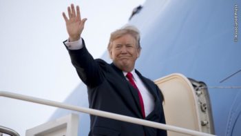 President Donald Trump waves as he boards Air Force One at Andrews Air Force Base, Md., Friday, Nov. 3, 2017, to travel to Joint Base Pearl Harbor Hickam, in Hawaii before he begins a five country trip through Asia.